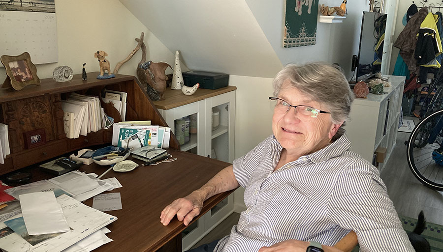 Jane at desk 1 – blog feature image